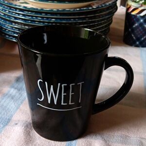 SWEET stoneware thats microwavable & dishwasher safe. Caution-handle can get hot